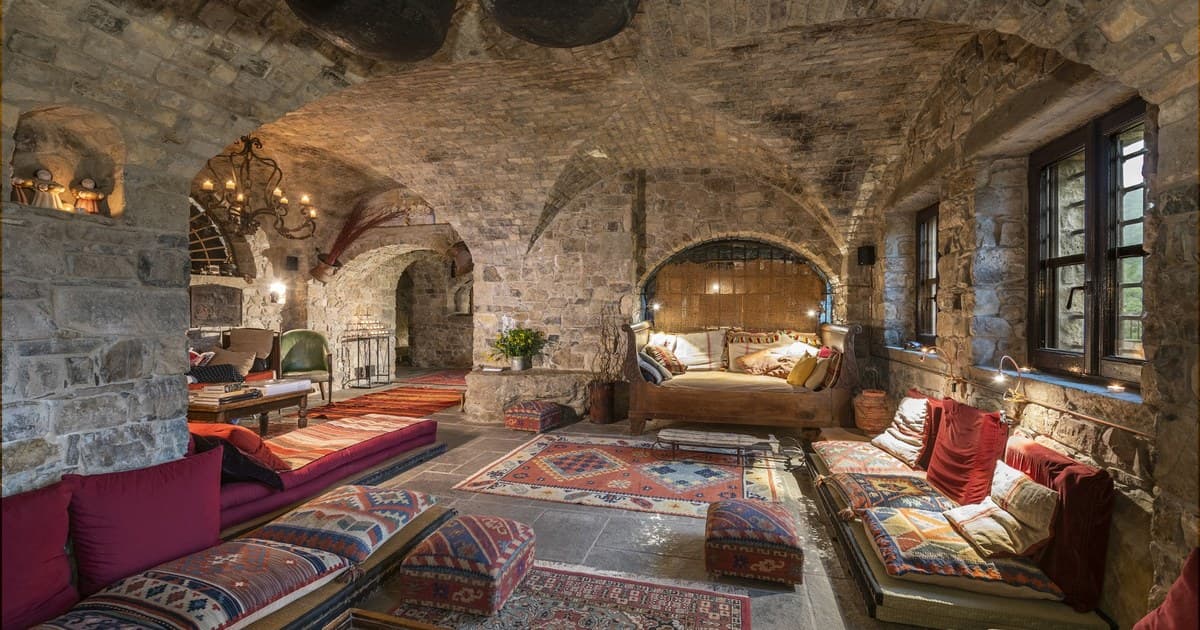 The candlelit stone interior at Eremito in Umbria